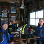 unknown pond hike 008 Having lunch while others are working hard on the roof. Linda, Chris and Bart